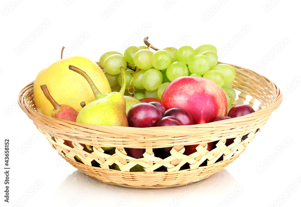 Mix of ripe sweet fruits and berries in basket isolated on Mix of ripe sweet fruits and berries in basket isolated on