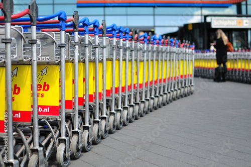 Luggage trolleys in a row