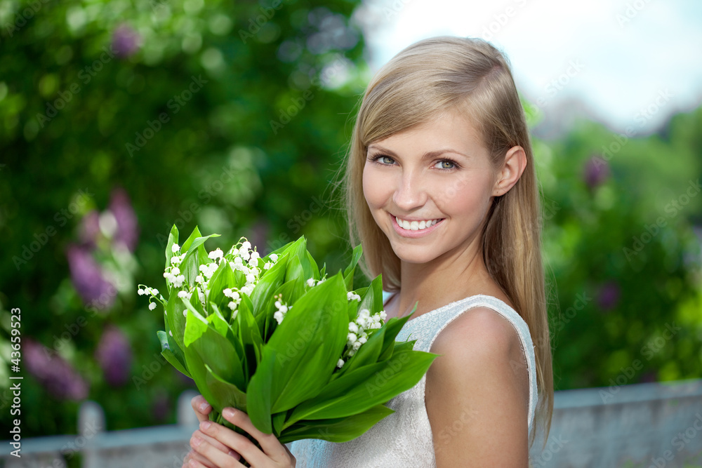 Portrait of young beautiful smiling woman outdoors Portrait of young beautiful smiling woman outdoors