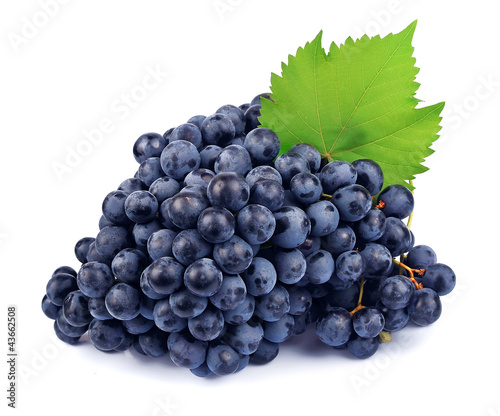 Red grapes with green leaf