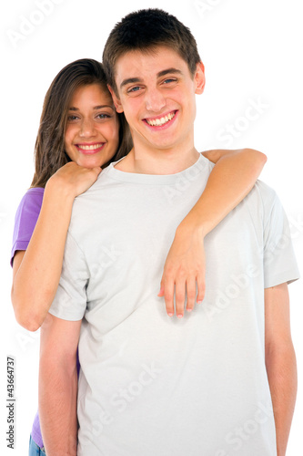 teenage girl embracing teenage boy