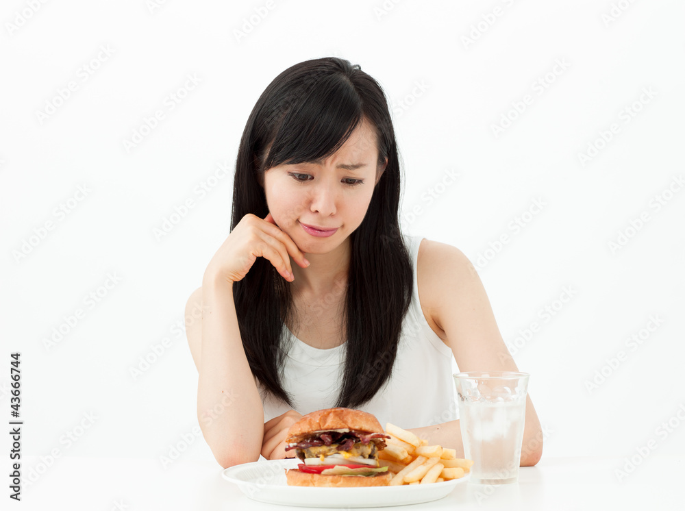 ハンバーガーを食べようとして考える女の子 ハンバーガーを食べようとして考える女の子
