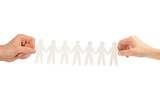 paper people in hands isolated on a white background