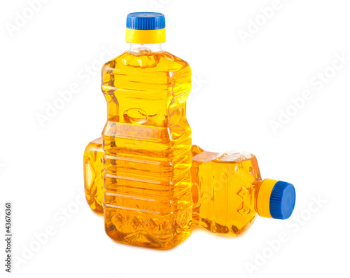Two plastic bottles with vegetable oil