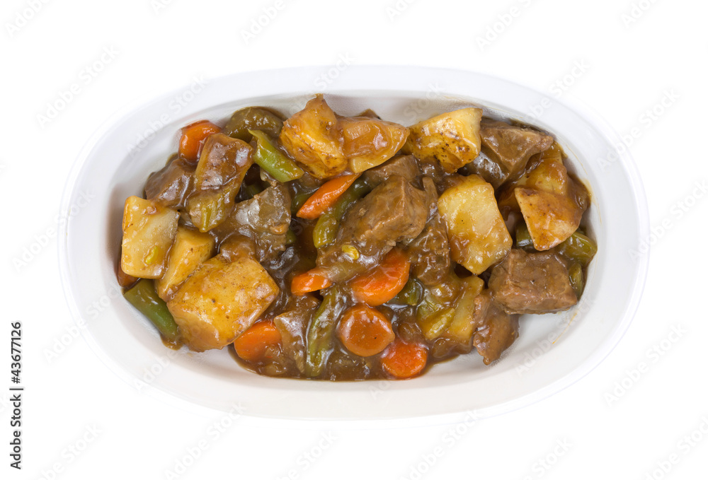 Roast beef with vegetables in cooking dish