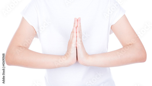 Woman hands greeting  over body isolated on background.