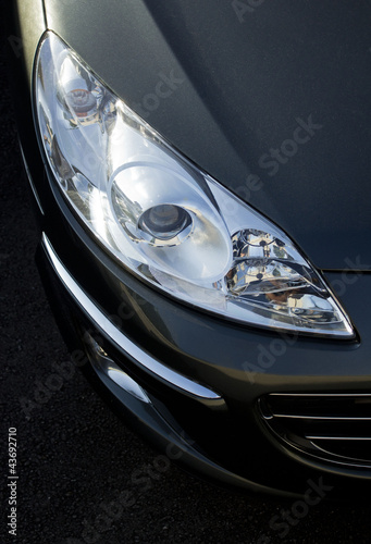 closeup of car head light. © sidbradypus