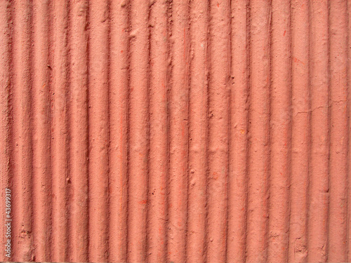 Textured orange plaster wall