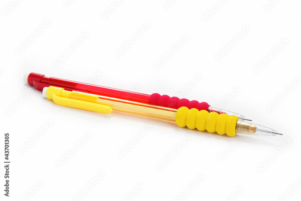 Office and school. Two automatic pencil on a white background. Office and school. Two automatic pencil on a white background.