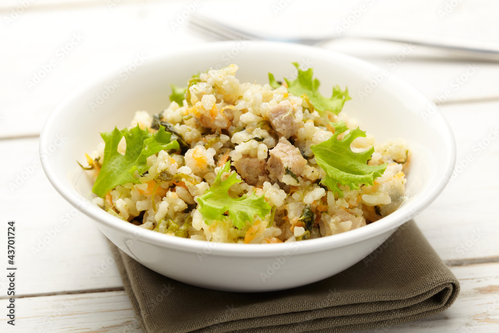 Rice with pork, carrots and spinach