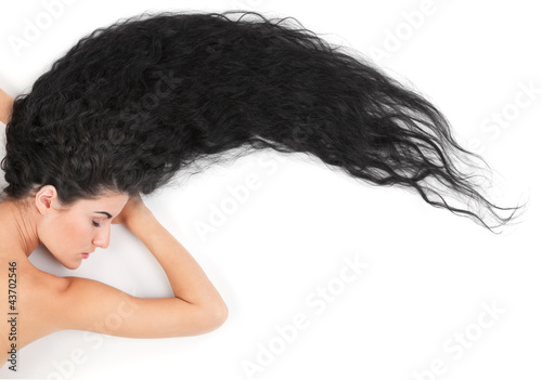 lying woman with long hair