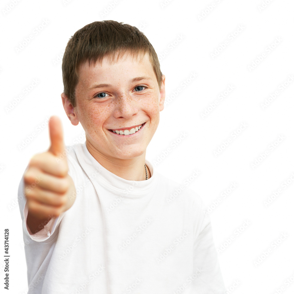 Portrait of young caucasian boy showing a thumbs up Portrait of young caucasian boy showing a thumbs up