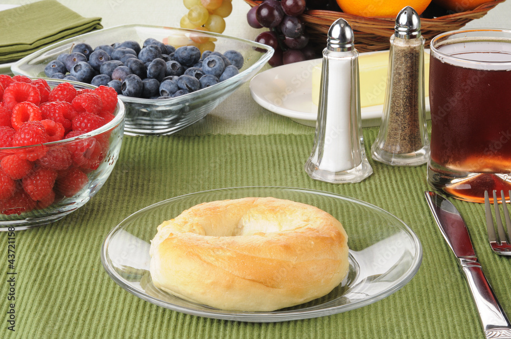 Fresh bagel with berries Fresh bagel with berries