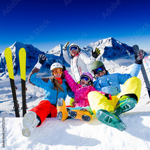 Skiing, winter fun - happy family ski team #43722535