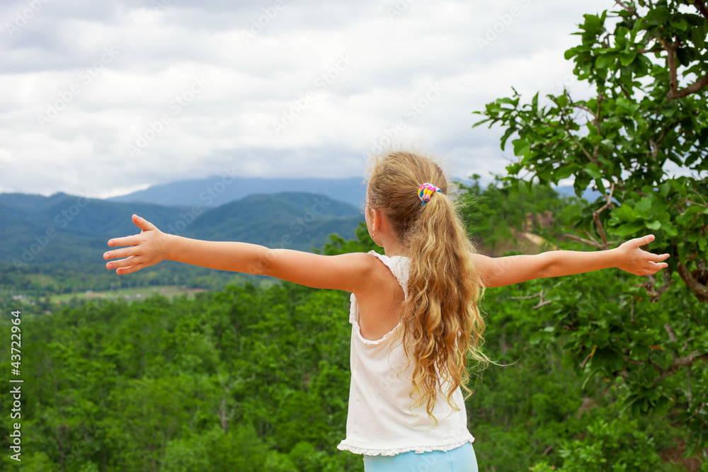 a girl near canyon pulling his hands to heaven a girl near canyon pulling his hands to heaven