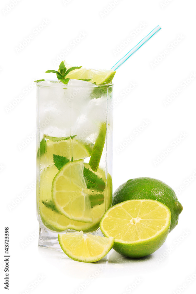 Mojito with lime, mint, ice and fruit near the glass Mojito with lime, mint, ice and fruit near the glass