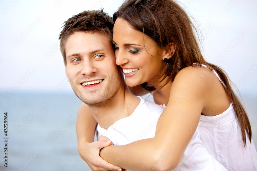 Man Carrying His Girlfriend on His Back