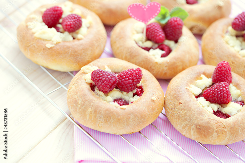 buns with raspberries