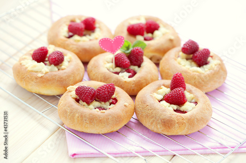 buns with raspberries