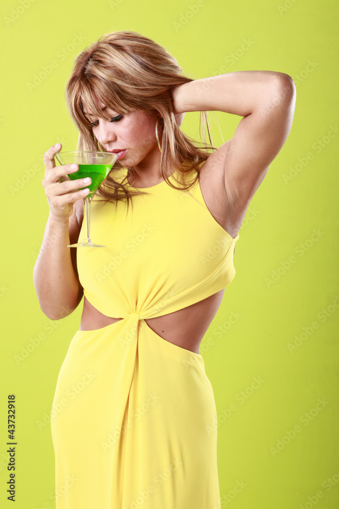 Lime cocktail on yellow, girl included Lime cocktail on yellow, girl included
