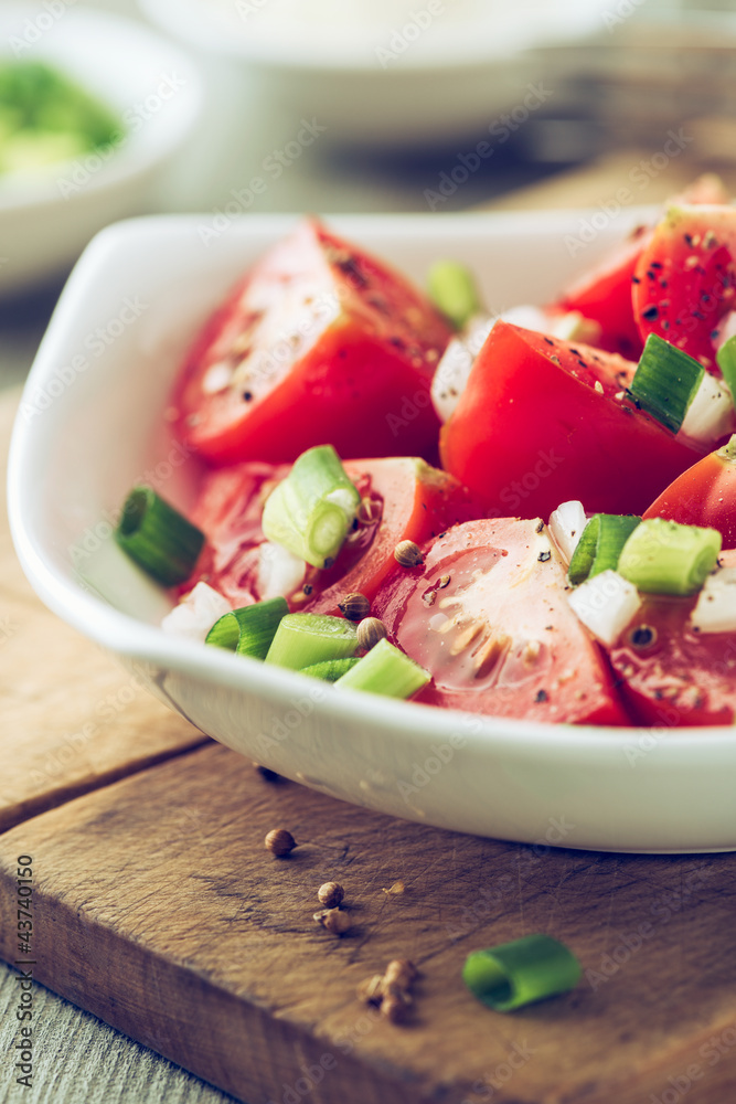 Tomato salad with spring onion and coriander seeds Tomato salad with spring onion and coriander seeds