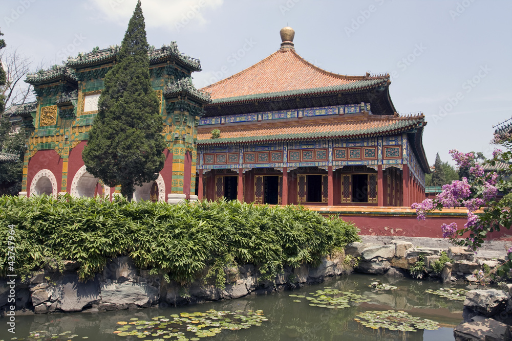 Naklejka premium Buddhist temple in the Beihai park in Beijing, China