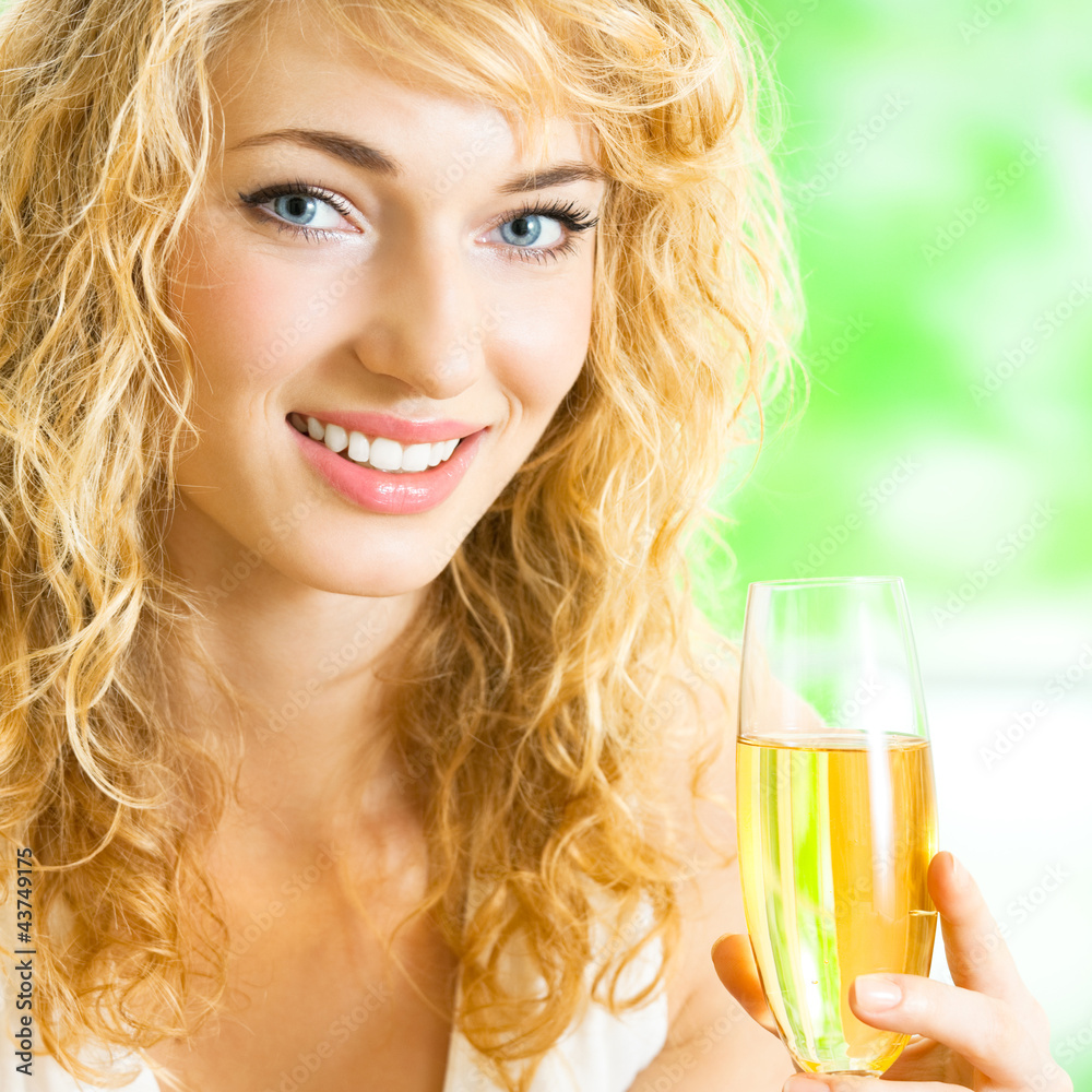 Young woman with glass of champagne Young woman with glass of champagne