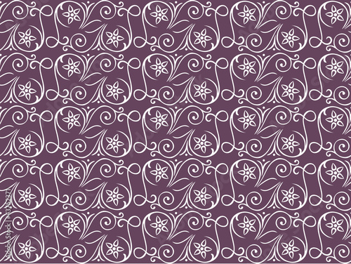 Seamless pattern on a lilac background with floral elements