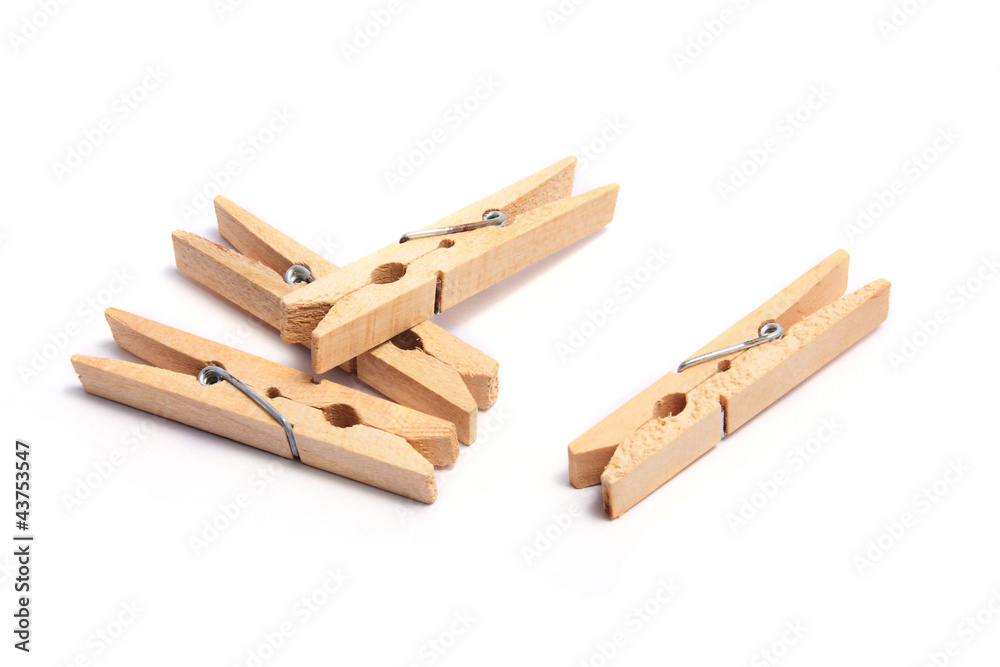 Wooden clothes clips isolated on white. Wooden clothes clips isolated on white.