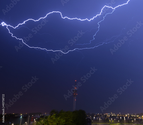 Horizontal lightning above telecommunitations tower