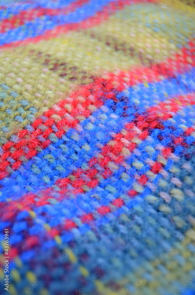 A Woven Woollen Picnic Blanket With Shallow Depth Of Focus
