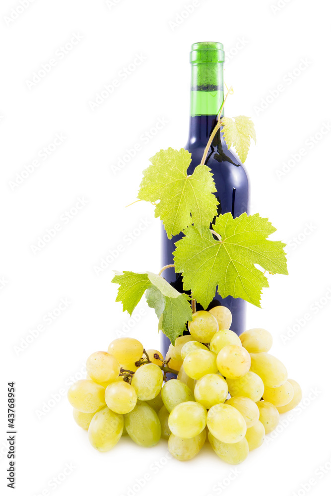 Wine Bottle and grapes with leaves.