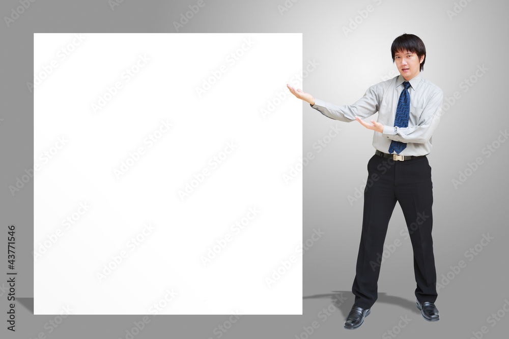 Asian business man showing blank signboard Asian business man showing blank signboard