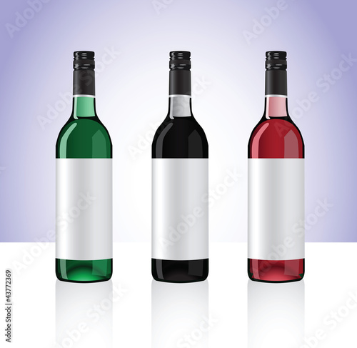 Three bottles of white, red and rose whine