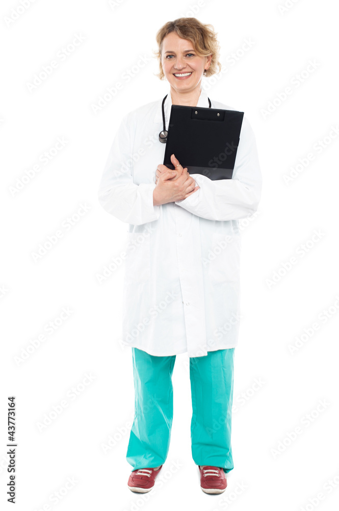Full length shot of an aged female doctor Full length shot of an aged female doctor