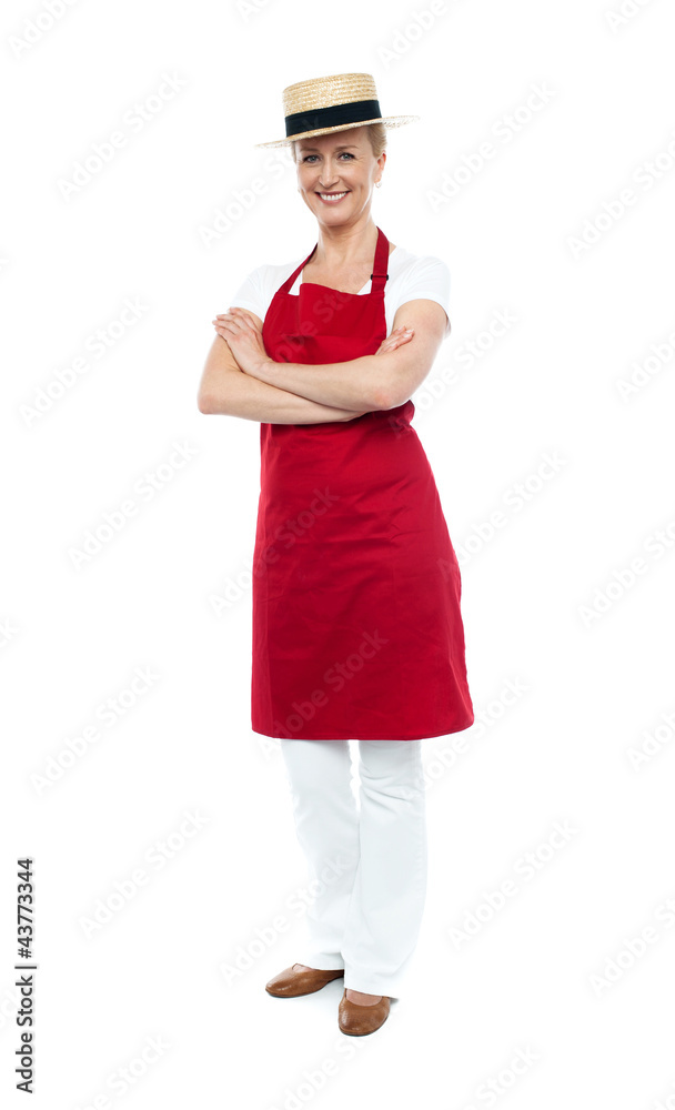 Beautiful confident chef posing in style, arms folded Beautiful confident chef posing in style, arms folded