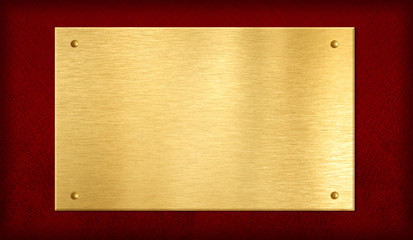gold plate or plaque on red background