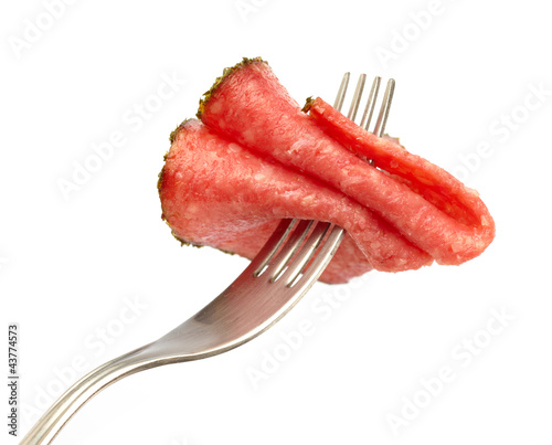 fork with salami sausage