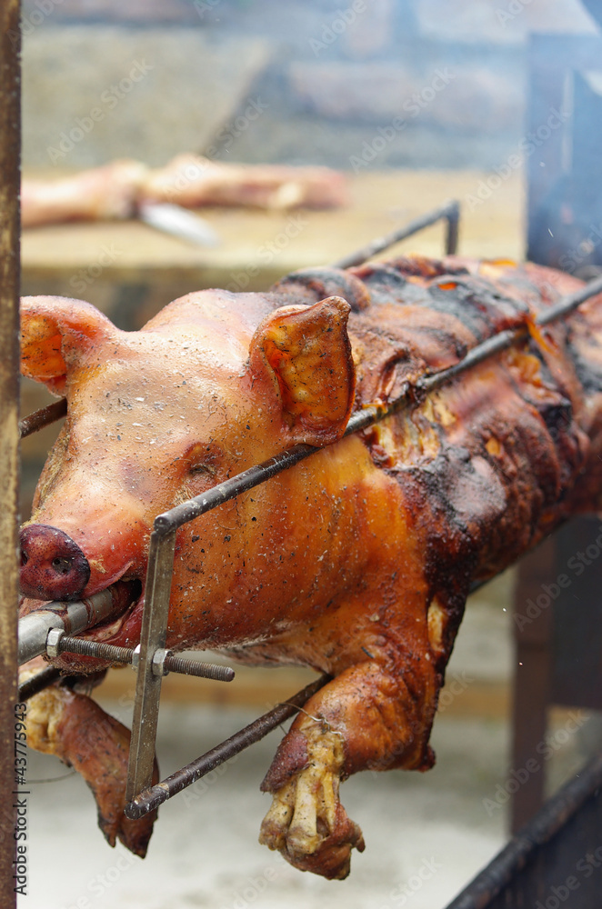 Cochon grillé à la broche Stock Photo | Adobe Stock