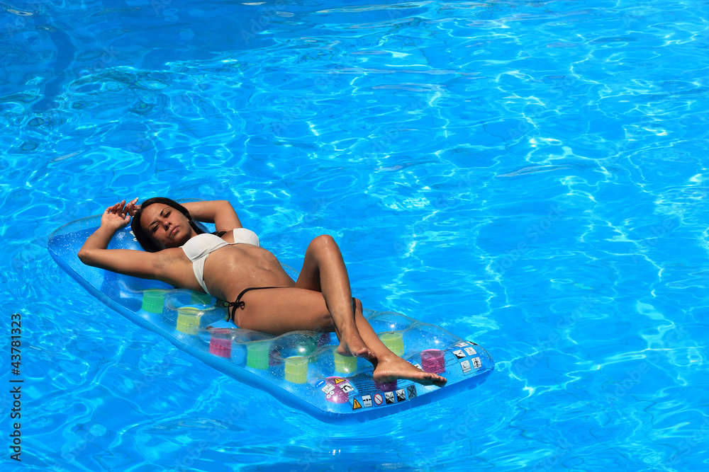 Woman Relaxing in a pool