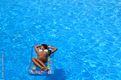 Woman Relaxing in a pool