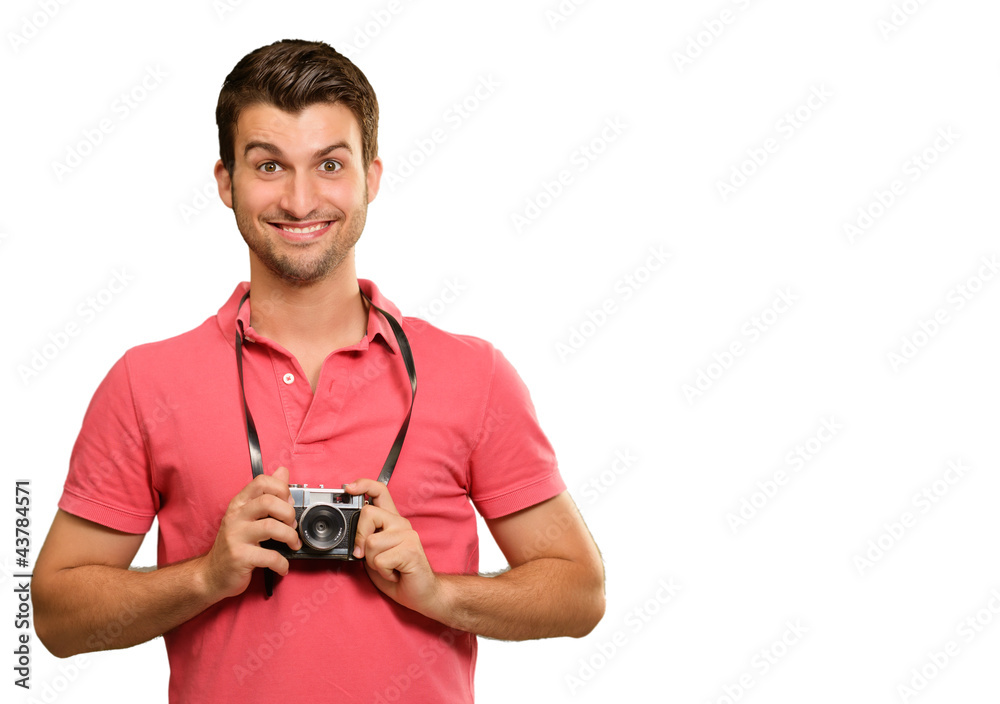 Portrait of a man holding camera Portrait of a man holding camera