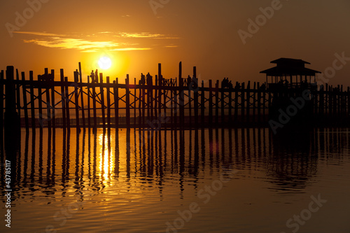 bridge and people silhouette in sunset time