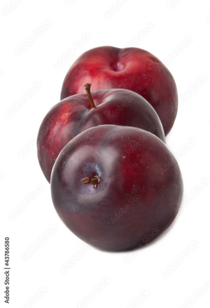 Red plum fruit isolated on white background 