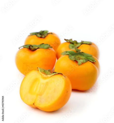 Persimmon tropical fruit slice on half