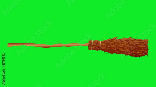 Animation of Witch's broom moving in center of a green screen.