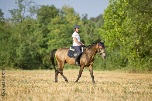 Riding a stroll through the fields in the nature © orangephoto