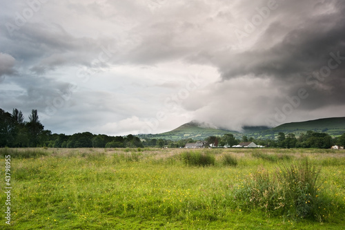 Countryside landscape image across to mountains in distance with
