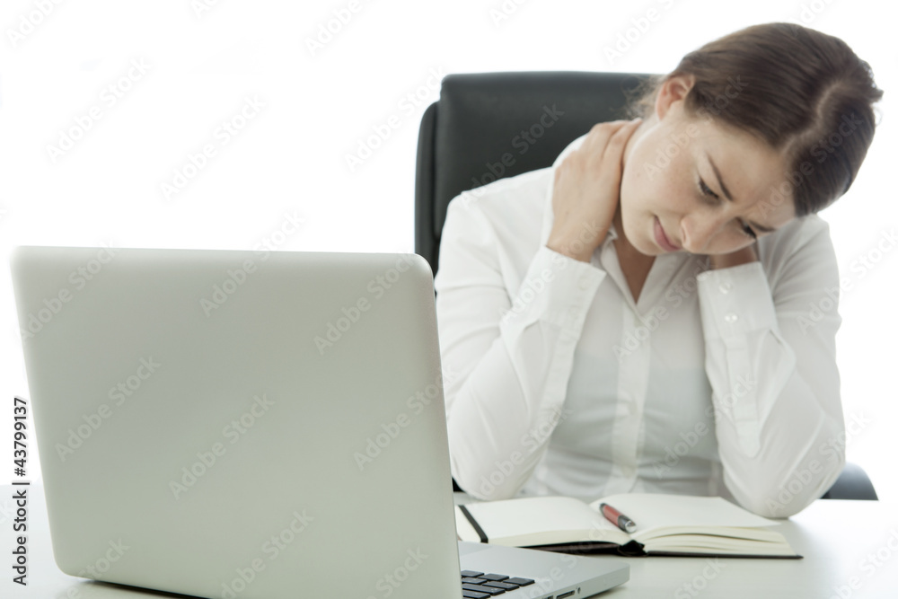 young brunette business woman has pain neck behind computer young brunette business woman has pain neck behind computer