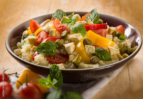 vegetarian couscous with tofu capsicum tomatoes mint and capers
